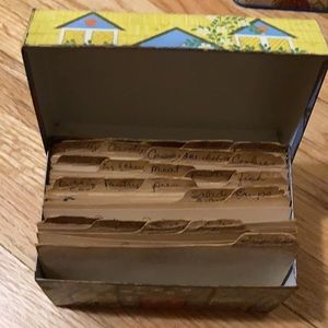 Vintage metal recipe box tin with some recipes.